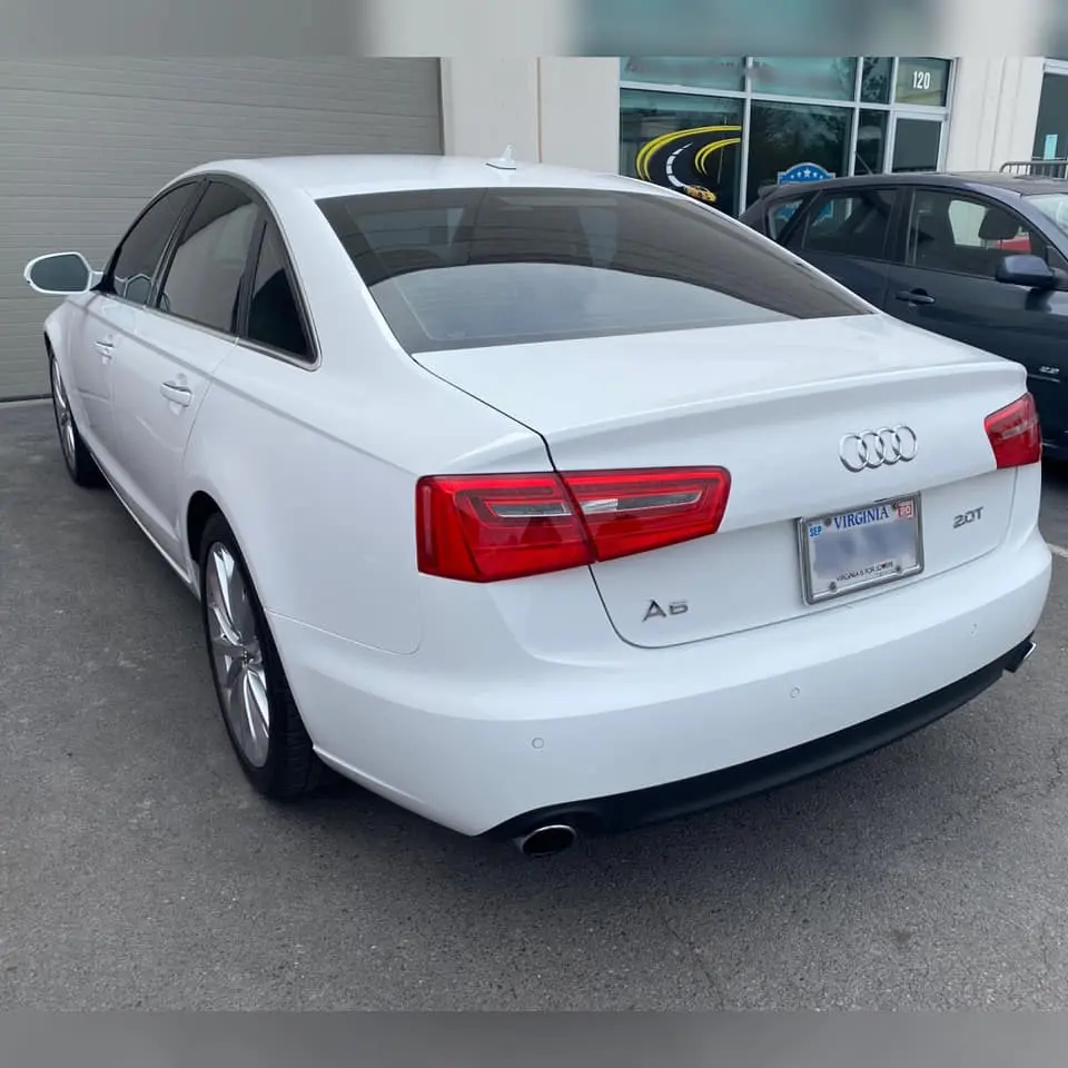 White audi with repaired bumper