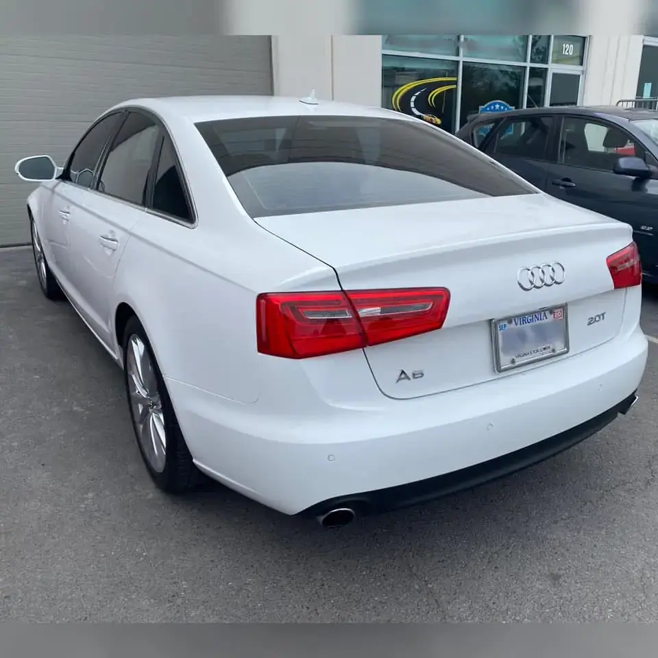 White audi with repaired bumper